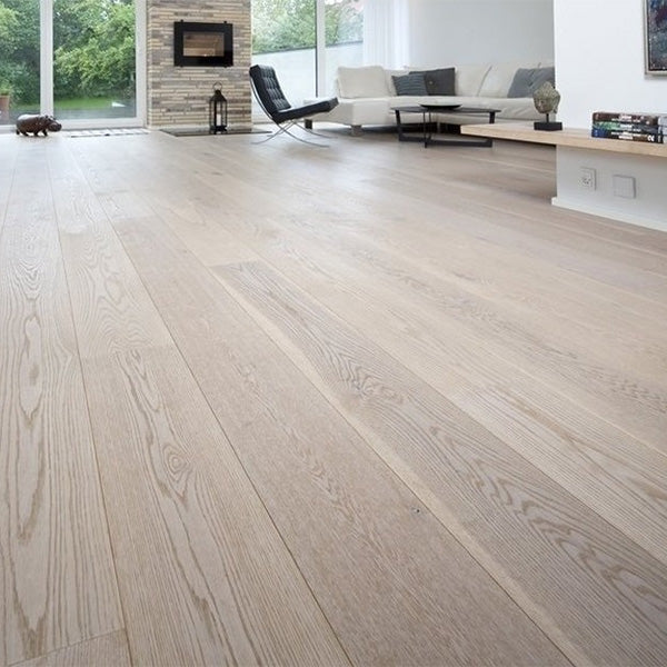 Photo of living room with wood flooring finished with WOCA Diamond Oil Active.